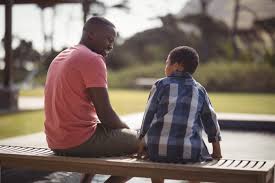 Father and his son having a Conversation